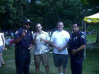 Chris and Bri chillin' with cops at Beer Fest 2000