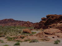 Valley of Fire! ~60 minutes from Vegas.

One of the most fun drives EVER. Through huge mountains and twisty roads. Amazing.